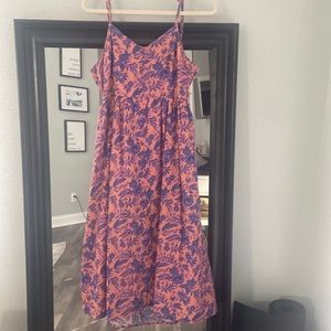 Size L Midi length dress with open back.
